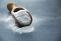 Glass bowl of baking soda. Spoonful of bicarbonate. Baking soda, Sodium bicarbonate, NaHCO3 Royalty Free Stock Photo