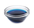 Glass bowl with blue food coloring isolated on white Royalty Free Stock Photo