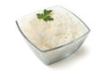 Glass bowl with boiled rice and parsley isolated on white Royalty Free Stock Photo