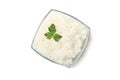 Glass bowl with boiled rice and parsley isolated on background Royalty Free Stock Photo