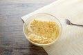 Glass bowl , chopsticks and instant noodle on the wooden table Royalty Free Stock Photo