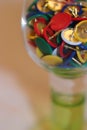 Glass bowl with colored pins