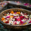 A glass bowl filled with colorful flowers floating on water Royalty Free Stock Photo