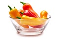 Glass bowl full of Chili or sweet peppers isolated on white background Royalty Free Stock Photo