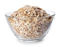 Glass bowl full of oat flakes Royalty Free Stock Photo