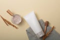 Glass bowl holds rice bran powder unbranded facial cleanser, cloth, and honey drizzle on minimalist backdrop. Cosmetics mockup Royalty Free Stock Photo