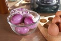 Peel shallots put in a glass bowl