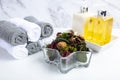 Spa theme. Aromatic Potpourri a set of towels soap and lotion Royalty Free Stock Photo