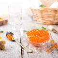 Glass bowl with red caviar Royalty Free Stock Photo