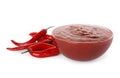 Glass bowl with red sauce and fresh chili peppers isolated Royalty Free Stock Photo