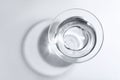 Glass bowl with water on white background, top view Royalty Free Stock Photo