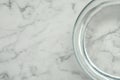 Glass bowl with water on white marble table, top view. Space for text Royalty Free Stock Photo