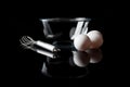 Glass bowl whisker eggs side view with reflection on black Royalty Free Stock Photo