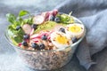 Bowl of wild rice with avocado, egg and lettuce Royalty Free Stock Photo