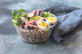 Bowl of wild rice with avocado, egg and lettuce Royalty Free Stock Photo