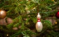 Glass bowling pins as decoration on a Christmas tree