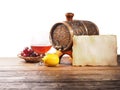 Glass of brandy, barrel, old paper on a white background Royalty Free Stock Photo