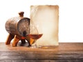 Glass of brandy, barrel, old paper on a white background Royalty Free Stock Photo