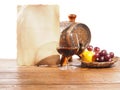 Glass of brandy, barrel, old paper on a white background Royalty Free Stock Photo