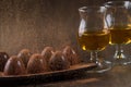 Glass of brandy with chocolate Royalty Free Stock Photo