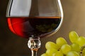 A glass of brandy and grape. Detail Royalty Free Stock Photo