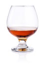 Glass of brandy on white background Royalty Free Stock Photo