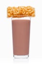 Glass of breakfast chocolate milk with cereal bar Royalty Free Stock Photo