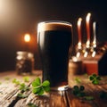 Glass of dark stout sits on wooden table, with sprinkling of shamrocks