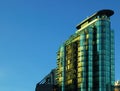 Glass building with blue sky Royalty Free Stock Photo