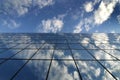 Glass Building for Business Reflection of Blue Sky and Clouds Royalty Free Stock Photo