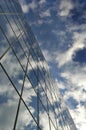 Glass Building for Business Reflection of Blue Sky and Clouds Royalty Free Stock Photo