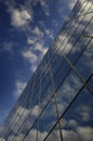 Glass Building for Business Reflection of Blue Sky and Clouds Royalty Free Stock Photo