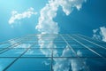 A glass building with clouds and blue sky Royalty Free Stock Photo