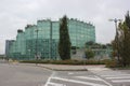 Glass building of ENI Headquarter office in San Donato, Milan, Italy