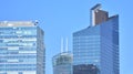 Glass building with transparent facade of the building and blue sky.