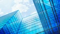 Glass building. Transparent glass wall of office building. Modern office building with glass facade on a clear sky Royalty Free Stock Photo