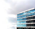 glass buildings,skyscraper with cloudy moody white sky background, Modern Office Building,modern architecture with copy space, Royalty Free Stock Photo