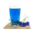 Glass of butterfly pea flower juice on white background Royalty Free Stock Photo