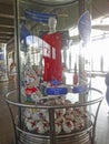 A glass cabinet with the symbols of the Confederations Cup 2017 and the 2018 FIFA World Cup, with a dummy in the form of a soccer