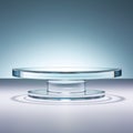 A glass cake plate with a circular base, glass podium, pedestal.