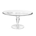 Glass cake stand on white table isolated on white background