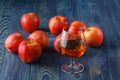 Glass of Calvados Brandy and red apples Royalty Free Stock Photo