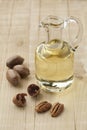 Glass can with pecan oil Royalty Free Stock Photo