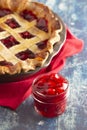 Glass Canning Jar Filled with Cherry Pie Filling on a Wooden Table Royalty Free Stock Photo