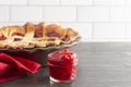 Glass Canning Jar Filled with Cherry Pie Filling on a Wooden Table Royalty Free Stock Photo