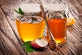Glass cans full of honey and apple. Royalty Free Stock Photo