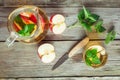 Glass and carafe of green tea with mint and apples Royalty Free Stock Photo