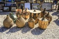 Glass carafes covered with raffia at an antiques flea market Royalty Free Stock Photo