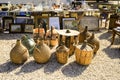 Glass carafes covered with raffia at an antiques flea market Royalty Free Stock Photo