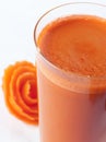 A glass of carrot Juice close up